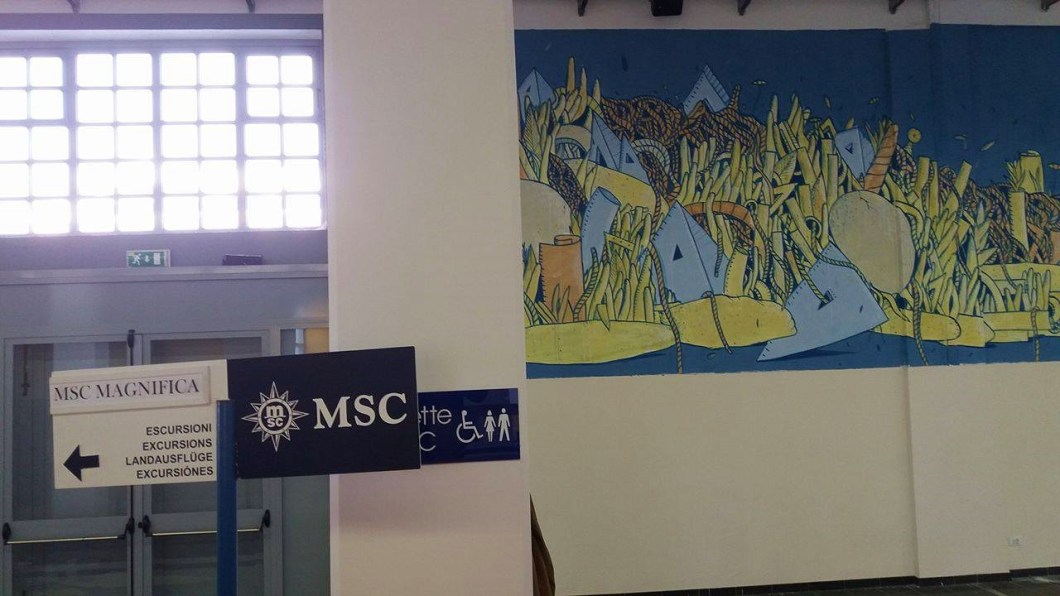 Dipinto realizzato a Genova sul Ponte Doria all'interno del principale punto di imbarco per il traffico crocieristico del porto di Genova. Il progetto è curato da Walk the Line  